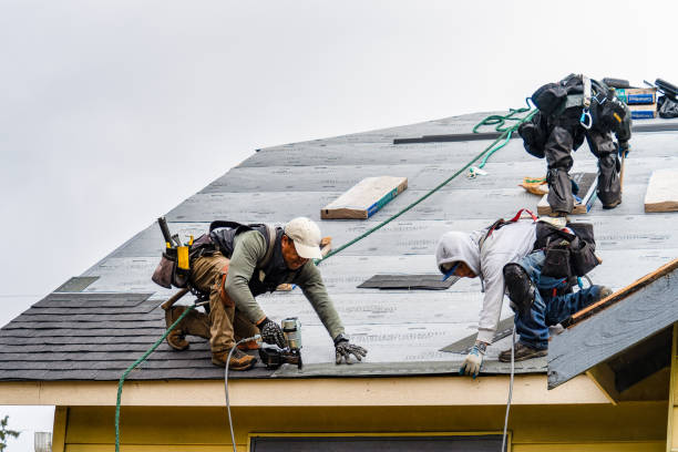 Professional Gutter Installation technician working in Gill, MA